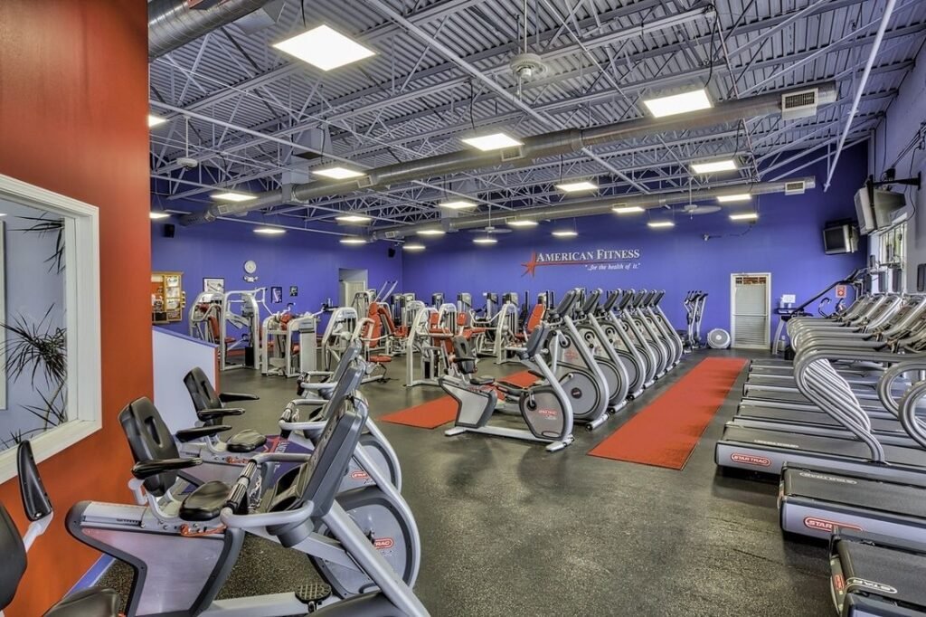 Row of cardio machines at Troy American Fitness gym in Troy, IL