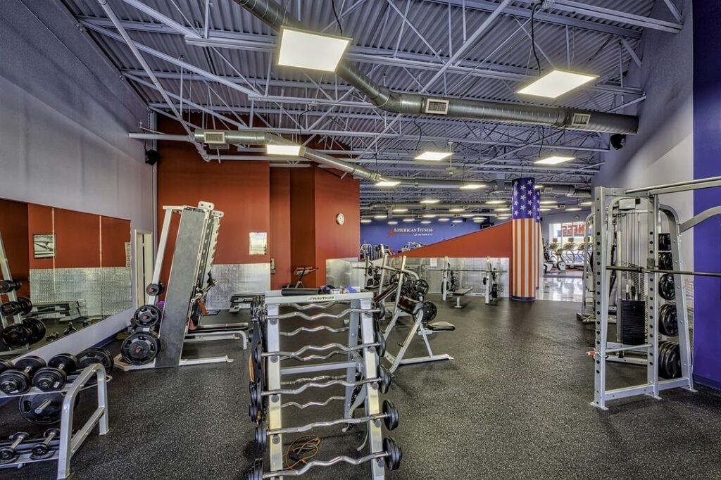 Free weights and Olympic bars at Troy American Fitness in Troy, IL