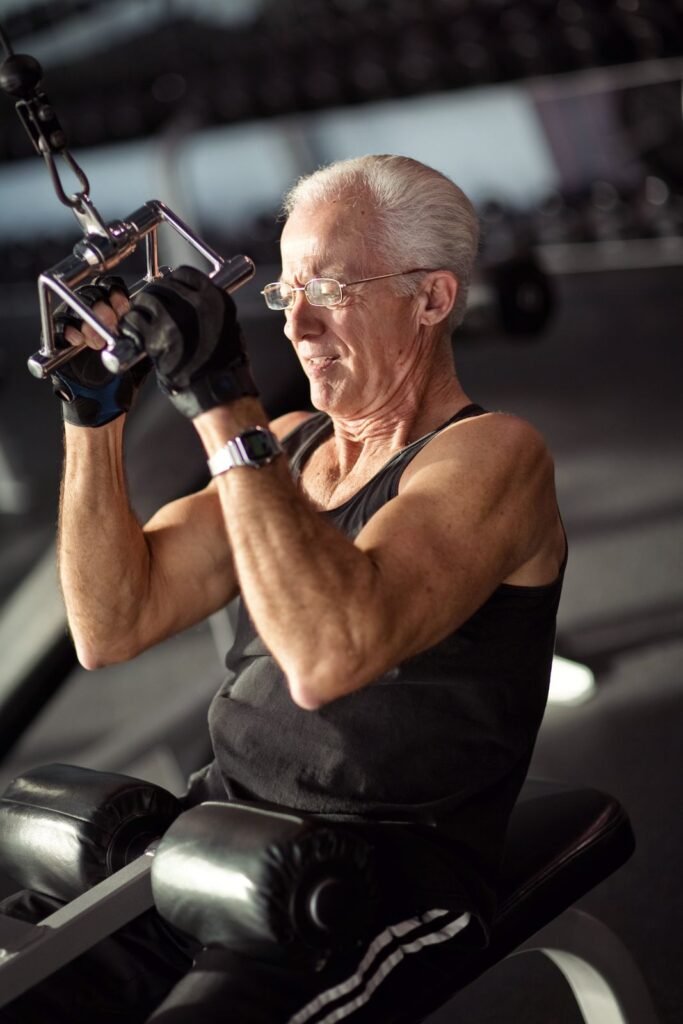 Member using the cable machine at Troy American Fitness