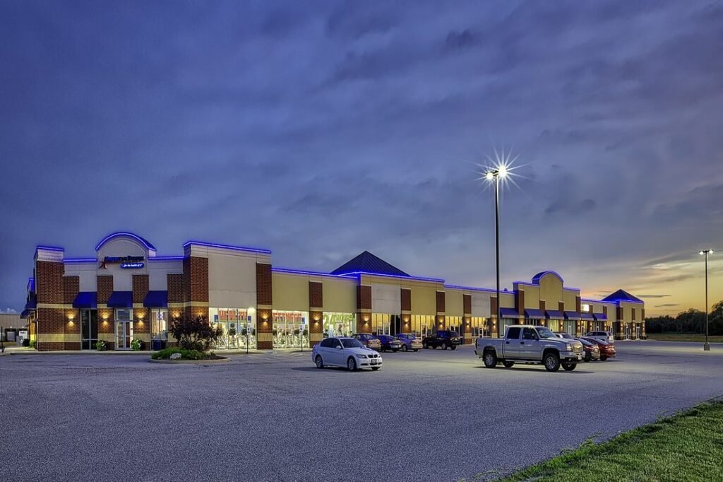 Troy American Fitness gym on Riedle Drive in Troy, IL at dusk